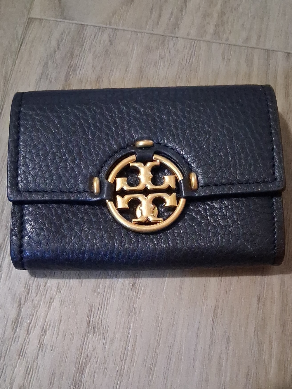 Tory Burch Black Pebbled Leather Trifold Wallet with Gold Emblem
